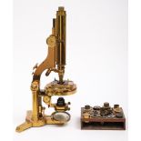 A brass monocular microscope by R & J Beck, London:, number 17009,