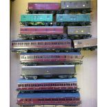 A collection of various scratchbuilt passenger coaches and rolling stock:, various liveries.