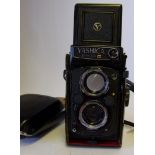 A Yashica 124G - twin reflex camera: and case.