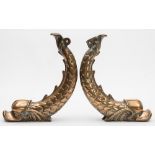 A pair of bronze dolphin gangplank supports for an Admiral's barge:, unsigned, 37.5cm high.