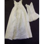 An early 20th century white work Christening gown: and petticoat.