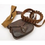 A leather cartridge bag and a leather twelve bore cartridge belt:.