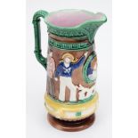 A Victorian majolica jug 'Our Army & Navy & Brave Volunteers':,