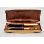 A Parker '51' fountain pen and ballpoint pen set in original box:,