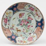 A Chinese porcelain charger: enamelled in the famille rose palette with a deer and lingzhi fungus