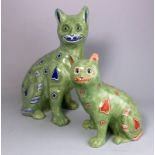 A Mosanic pottery cat and kitten: both in seated posture with curled tail with inset glass eyes,