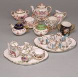 A group of Coalport porcelain miniature wares and two Crown Staffordshire services: comprising a