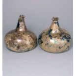 A pair of squat onion wine bottles: of dark olive colour with pronounced 'kick up',