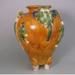 An Oriental sancai glazed pottery vase: in Tang-style, applied with elephant heads,