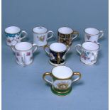Eight Royal Crown Derby miniature tygs,