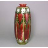 A Minton pottery Secessionist vase: of slender oviform tubelined with peacock feather motifs and