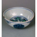 A Chinese Doucai medallion bowl: painted with fruiting trees and sprays of pomegranates,