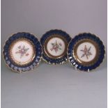 Three Worcester First Period porcelain shallow dishes: of circular scalloped form,