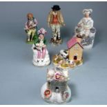 A group of pearlware and other porcelain figures: of children with animals together with a kennel