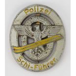 1.2.) Deutsches Reich (1933-45) Polizei Schi-Führer Abzeichen.Buntmetall hohl geprägt, versilbert,
