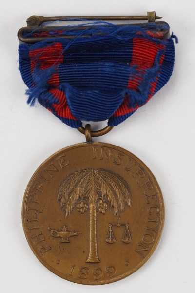 2.2.) Welt USA: Philippinen Feldzugsmedaille.Bronze, im Rand geschlagene Nummer "M.N.o 2284", am