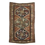 Caucasian-Cloud Band-rug end of the 19th century, ghiordes-knot, worn, damaged, with old repairings,