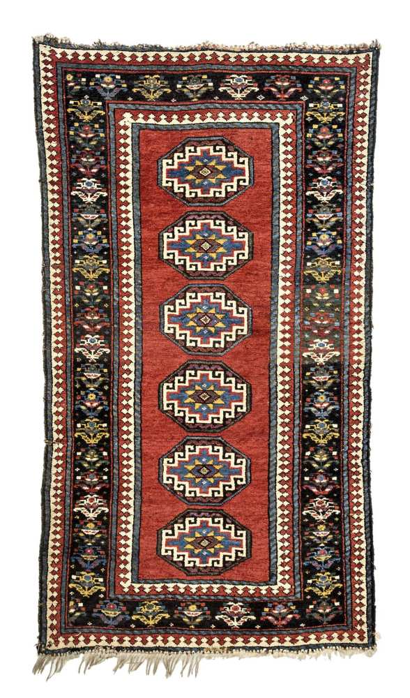 Caucasian-Kazak-rug around 1900, ghiordes-knot, slightly worn, incomplete at the ends, moth-eaten,
