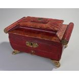 Regency red leather sewing box, the gadrooned top above gilt heightened decoration, scroll reeded