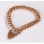 9 carat gold padlock bracelet, with a chain linked bracelet and 9 carat gold padlock clasp, 16.7