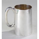 George V silver pint mug, London, 1926, tapering body and arched handle, glass bottomed, 12cm high