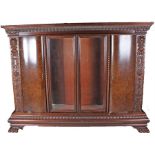 Large 19th Century style mahogany bookcase, the cornice top with lappet and dash moulding, above a