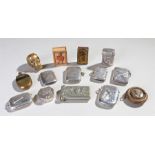 Collection of vestas, to include silver examples, a brass skull example, a Chinese silver vesta, two