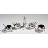 George VI silver matched condiment set, to include two silver mustards with blue glass liners, two