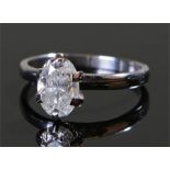 18 carat white gold solitaire ring, the oval diamond at approximately 1.5 carats set in six claws,