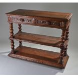 Early 20th Century oak buffet, the rectangular top above two carved frieze drawers and barley