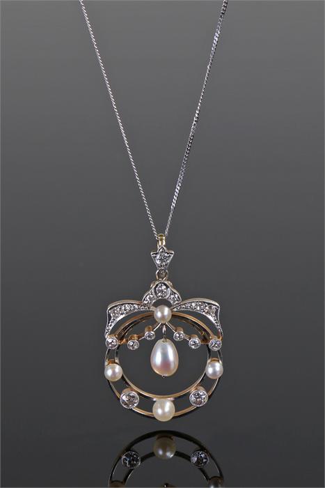 Diamond and pearl set necklace pendant, the central drop pear framed with diamonds and pearls,