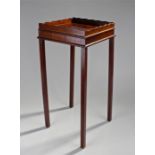 George III style mahogany kettle stand, the square top with high undulating gallery above a frieze