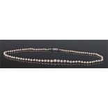 Pearl necklace with a row of graduating pearls, with a 9 carat gold diamond set clasp, 58cm long