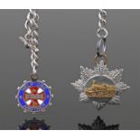 Silver pocket watch chain, with T bar and two train medals attached, chain length 35cm long