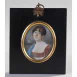 Early 19th Century miniature of a lady, with brown hair, red and white top with blue cloak, 50mm