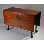 19th Century mahogany drop leaf dining table, the rectangular top with drop leaf sides, upright