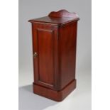 Victorian mahogany bedside cabinet, the rectangular top with a long door and plinth base, 40cm x