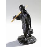 Meiji Japanese bronze okimono, of an elderly fisherman holding his catch, ivory pole to the right