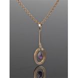 15 carat gold amethyst and pearl pendant, the drop pear amethyst surmounted with three pearls,