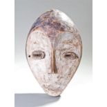 Lega mask, with carved features, criss cross eye decoration, 28cm high