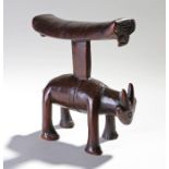 Shona headrest, in the form of a buffalo, slightly arched headrest with line decoration to the ends,