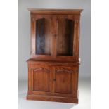 George III style oak bookcase cabinet, with a concave cornice, dental moulding, a pair of glazed