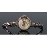 Ladies 9 carat gold wristwatch, the gilt dial with Arabic hours, 9 carat gold strap, manual wound,
