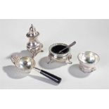 Indian silver tea strainer and stand, together with a silver plated salt with spoon and pepper, (4)