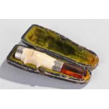 Cheroot holder, with an amber mouth piece, silver collar and meerschaum end, case