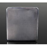 George VI silver cigarette case, London 1938, maker S.J.R, the engine turned case with canted