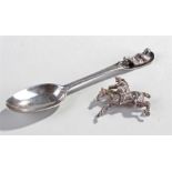 Novelty silver, to include a a shooting spoon and a horse, (2)