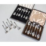 Silver spoon sets, to include two cased examples of six spoons and an uncased example of six spoons,