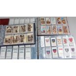 ** Three albums of cigarette cards. Depictions in first album including First Aid Guidance, Art