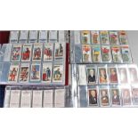 ** Three albums of cigarette cards. The first album to include depictions of 'Film Stars' and '